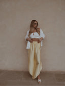 Baby yellow satin pants with slits